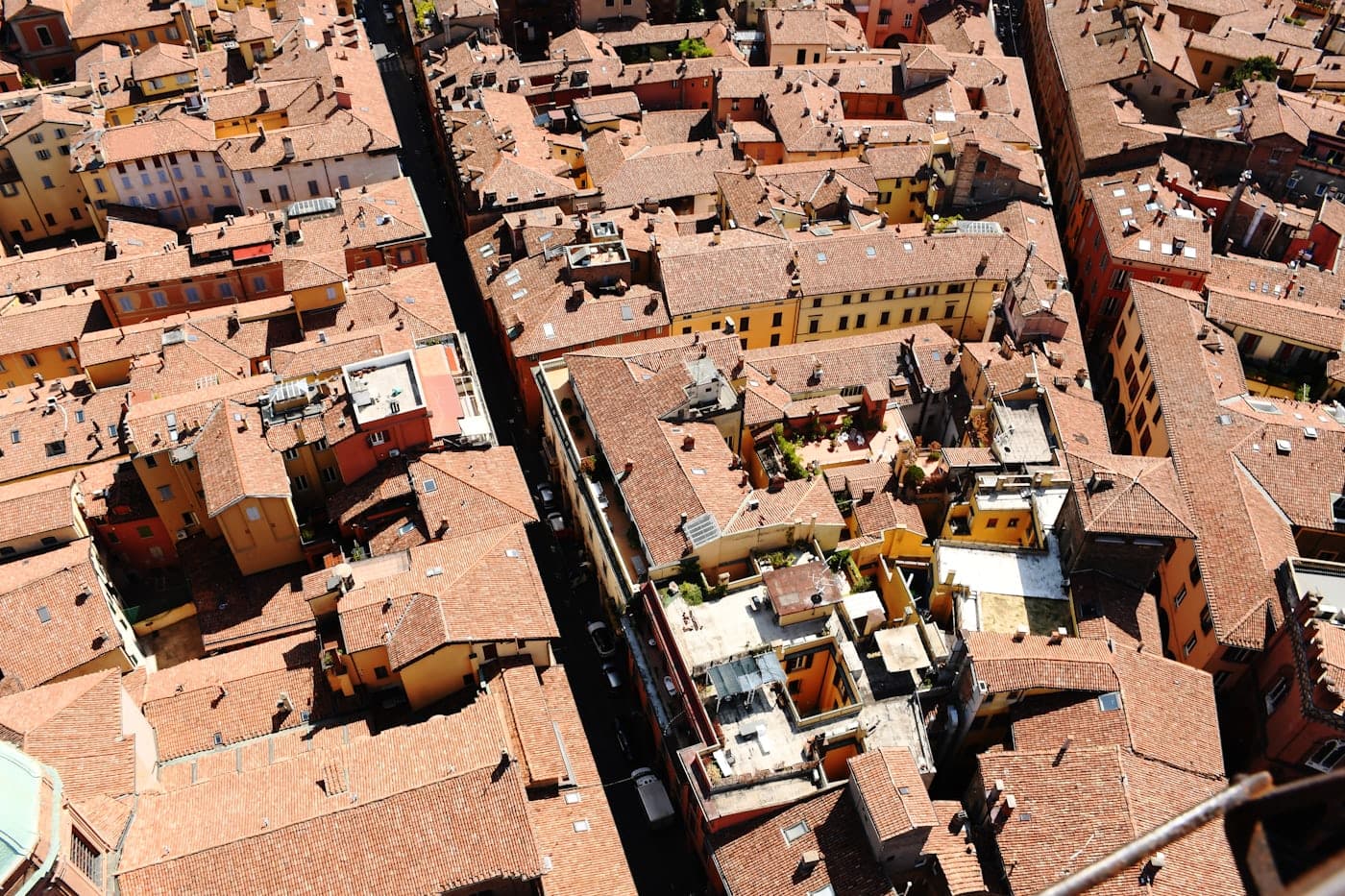 Aerial view of Bologna's medieval towers and terracotta rooftops
