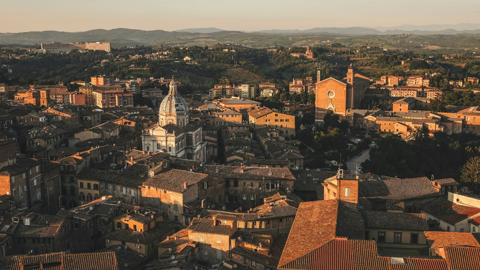Aerial view of Siena's historic rooftops and old-town architecture